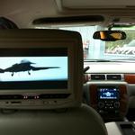 Chevy Tahoe 9" headrest monitor with built in DVD.
