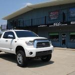 Toyota Tundra with a Fabtech 6" lift 20" XD Monster wheels, 35" Nitto Trail Grappler tires