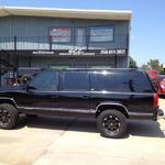 Chevy Suburban with level kit and ATX wheels