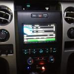 Kenwood Navigation DVD system installed in a F150, integrated into the factory Ford SYNC system and backup camera.